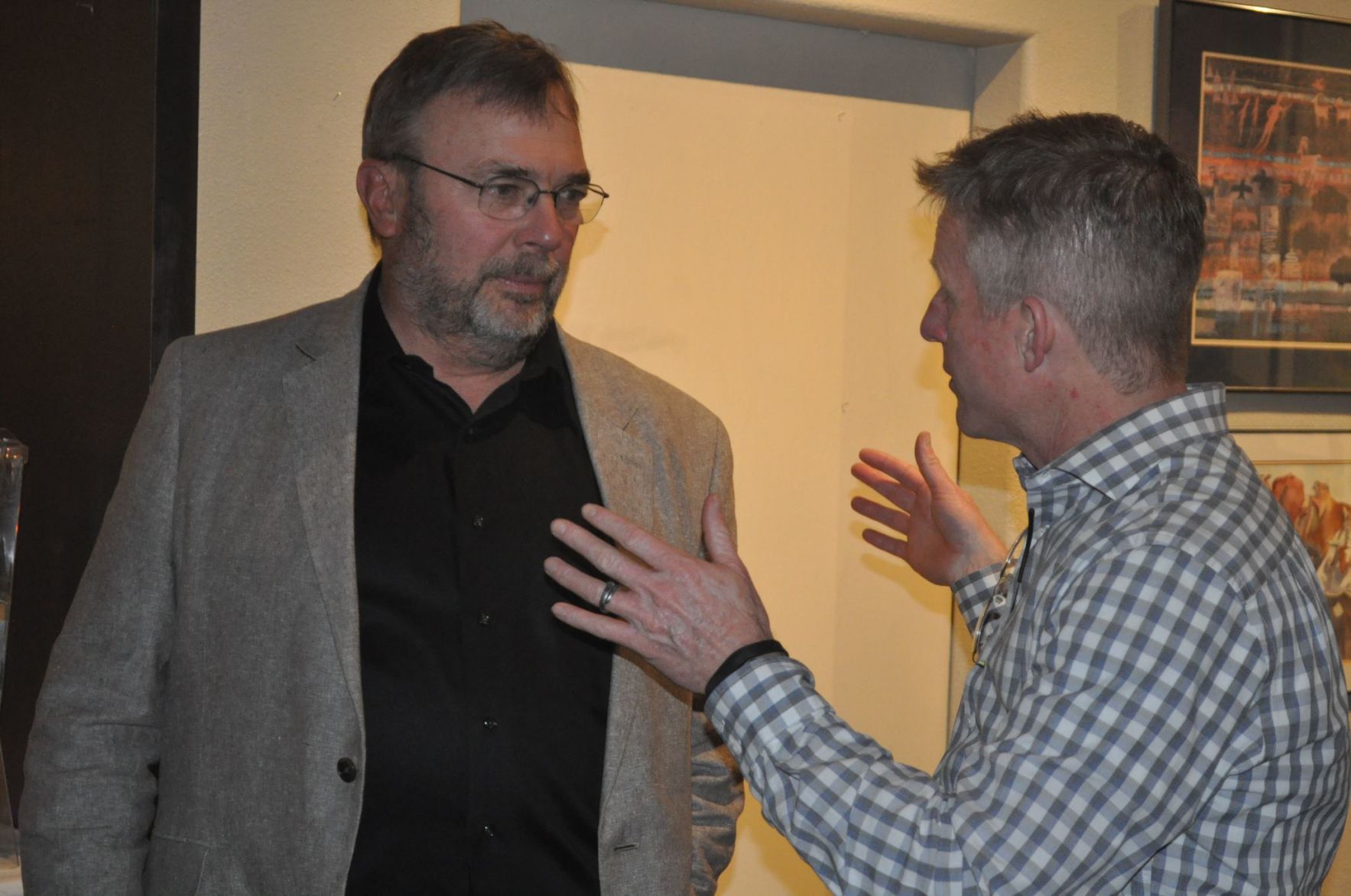 Rep. Mat Erpelding speaks with John Andrechak, chair for Idaho County Democrats